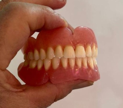 تنظیم و ریلاین دندان مصنوعی